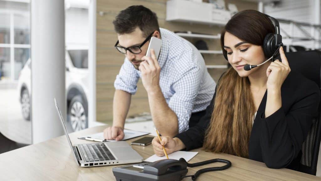 colleagues working together office 1 1 scaled